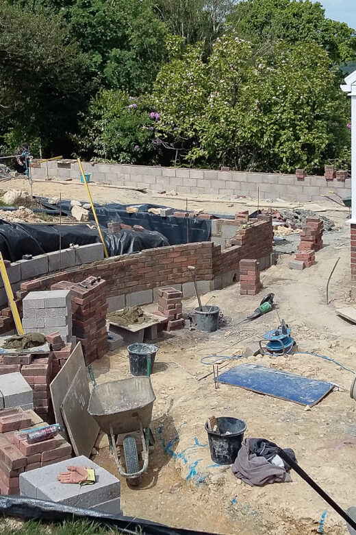 Landscaping, drainage, gate piers, porch 19