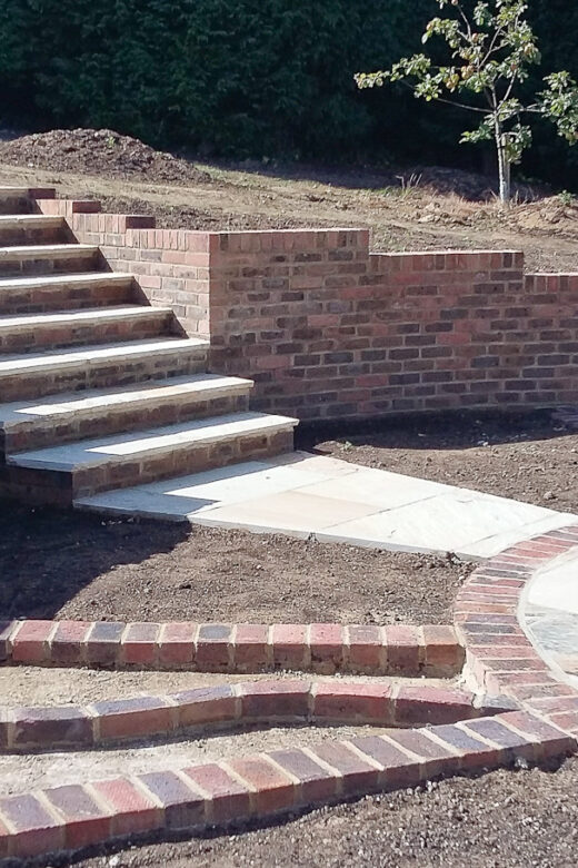 Landscaping, drainage, gate piers, porch 38