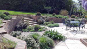 Landscaping, drainage, gate piers, porch completion 7