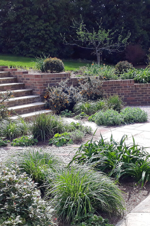 Landscaping, drainage, gate piers, porch completion 7